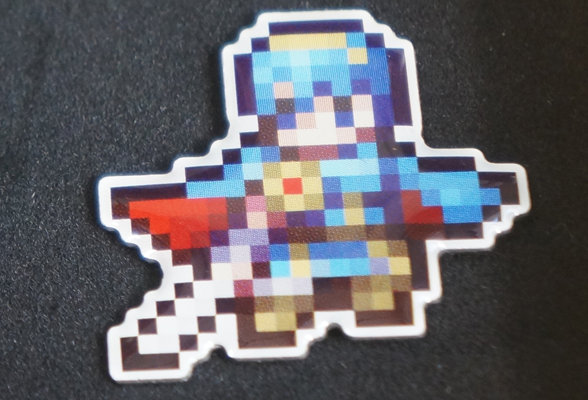 Alm's iconic pin in Fire Emblem